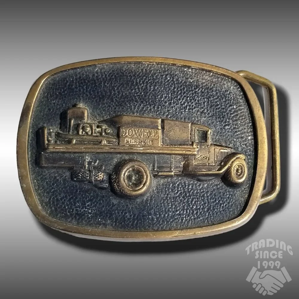 Belt Buckle 1981 Dowell Service Oil field Brass Truck Limited Edition 7 Million‎